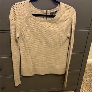 Light brown knit sweater.